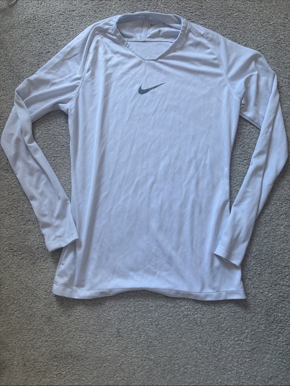 Nike White Long-Sleeve Athletic Top with Gray Swoosh
